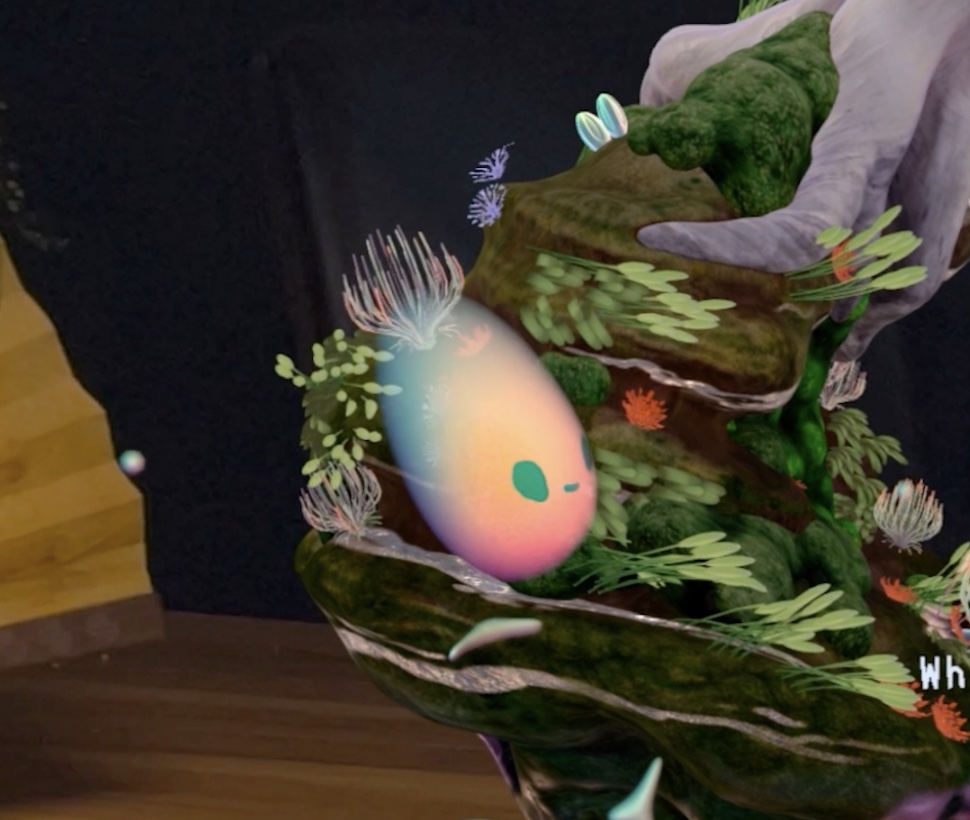 Close-up of the Wisp — a glowing, soft-faced forest spirit among moss and plants